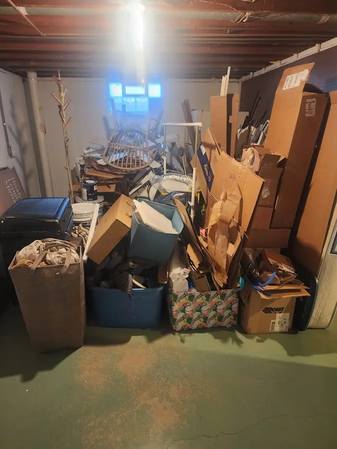 Roll-off dumpster container at job site for Cleanout Dumpster Rental in Fox Point